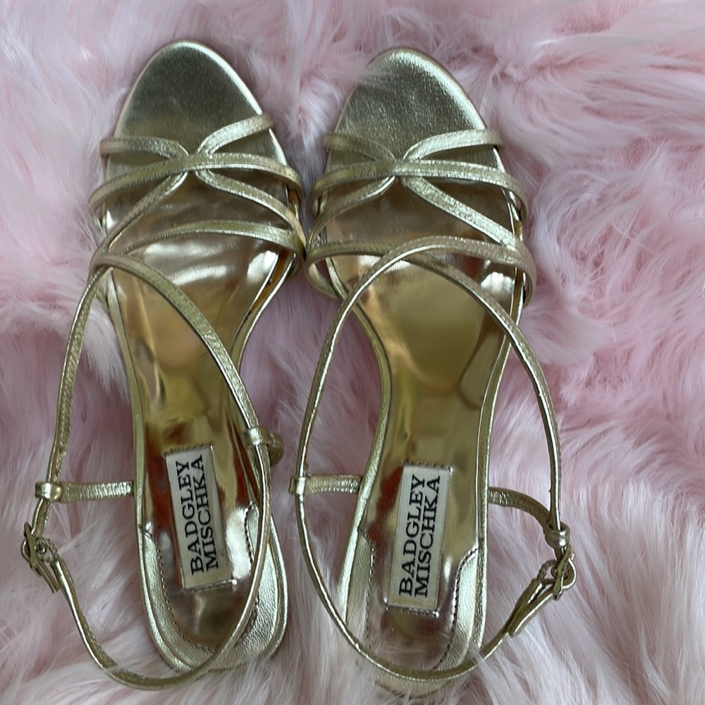 Badgley Mischka leather sole heels.